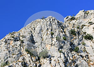 View on the Biokovo mountains taken from the historical tower in Omis, Croatia