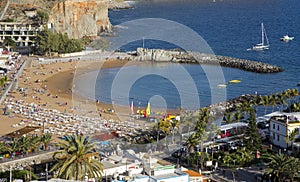 View from the bird`s eye view to the dock with yachts and beach