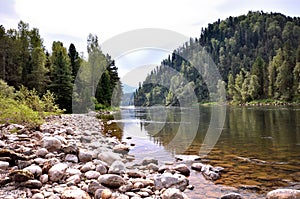 View of the Biya river against the background of mountains