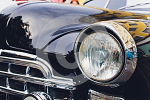 View of black classic vintage Soviet car Gaz.