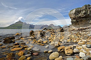 View of the Black Cuillin mountain range from the beach of Elgol across Loch Scacaig, Isle of Skye, Highlands, Scotland, UK