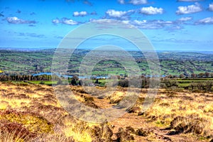View from Black Down Mendip Hills Somerset towards Blagdon Lake in colourful HDR