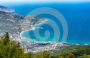 View of the Black Sea from Mount Ai-Petri. Below the village of Alupka Big Yalta. Cloudy sunny weather