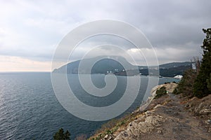 View of the Black sea and mountain Ayu-Dag Sleeping bear under stormy sky with clouds