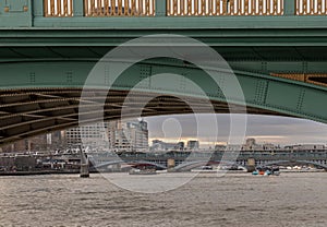 View of Blackfriars Bridge and Millennium Bridge Looking through underneath Southwark Bridge