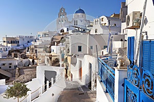 View of a blue domed church in the village of Pyrgos in Santorini, Greece