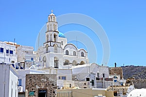 View of a blue domed church in the village of Pyrgos in Santorini, Greece