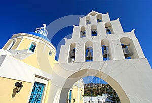 View of a blue domed church in the village of Vothonas in Santorini, Greece