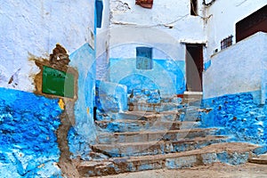 View of the blue old walls of Tetouan Medina quarter in Northern Morocco. A medina is typically walled, with many narrow and maze-