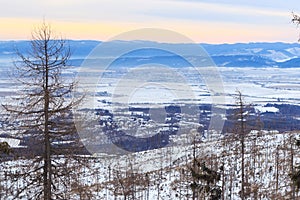 View of a blue plateau with small slovak village from a ski and hiking Hrebienok resort.