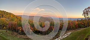 A view of the Blue Ridge Parkway in Boone, NC during the autumn fall color changing season sunset