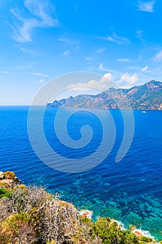 A view of blue sea on coast of Corsica island near Girolata bay, France