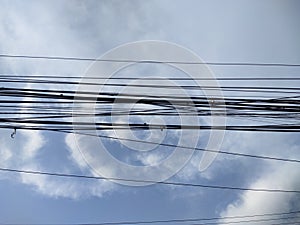 view of blue sky and clouds power lines