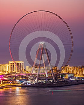 View of Bluewaters Island and Dubai Eye Observation Wheel after Sunset. Dubai - UAE. October 2019