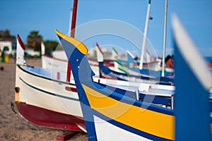 View of a boat in on a beach in Calella photo