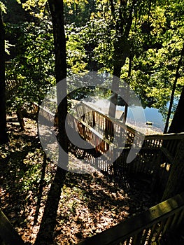 View of the boat dock with sun reflecting off the lake