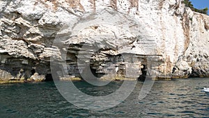 view from the boat of the famous rock caves of the Gargano coast