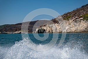 view from the boat of the famous rock caves of the Gargano coast