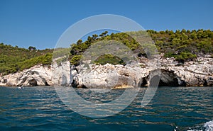 view from the boat of the famous rock caves of the Gargano coast