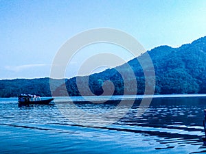 View of boat in cirata lake west java indonesia photo