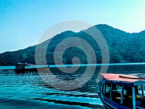 View of boat in cirata lake west java indonesia photo