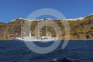 A view from a boat towards the caldera at Skaros rock