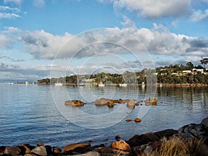 View of boats moored in Coles Bay