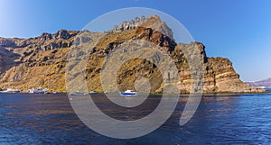 A view of boats moored off the island of Thirasia, Santorini