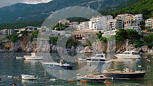 View of boats on water during sunset on coastline of Adriatic sea, Montenegro