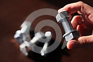 View of the bolts and nuts fasteners. A bolt is a form of threaded fastener with an external male thread.