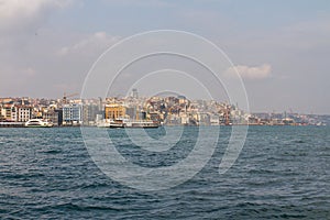 View of the Bosphorus and Istanbul`s Besiktas district on a sunny day. Turkey photo