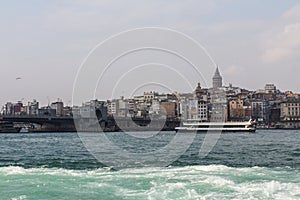 View of the Bosphorus and Istanbul`s Karakoy district on a sunny day. Turkey photo