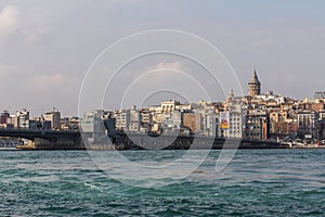 View of the Bosphorus and Istanbul`s Karakoy district on a sunny day. Turkey