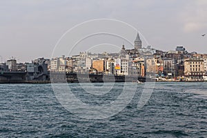 View of the Bosphorus and Istanbul`s Karakoy district on a sunny day. Turkey photo