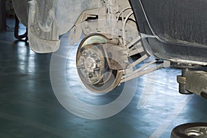 View of the brake mechanism of the rear right wheel of the car