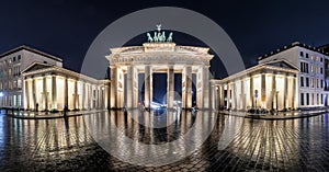 View of the Brandenburg Gate in Berlin, Germany, during a rainy night