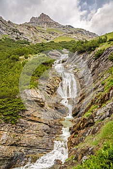 View at the Braulio Waterfall on the road to Stelvio Pass - Italy