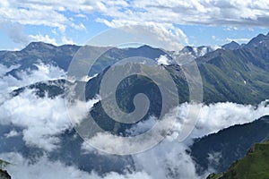 View from Bric Bouchet into the Italian alps on a sunny day