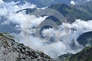 View from Bric Bouchet into the Italian alps on a sunny day