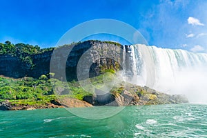 View on the Bridal Veil Falls and American Falls of the Niagara Falls, the part of Goat Island, the Cave of the Winds