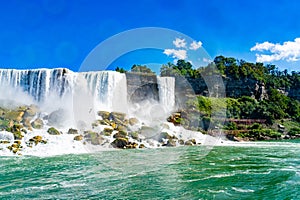 View on the Bridal Veil Falls and American Falls of the Niagara Falls, the part of Goat Island, the Cave of the Winds