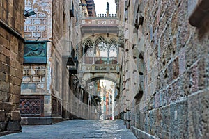 View of bridge between buildings in Barri Gotic quarter of Barcelona, Spain