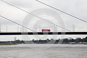 View at the bridge with a bus driving at the rhine riverbank in dÃÂ¼sseldorf germany