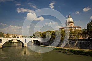 View of a bridge and church in Rome