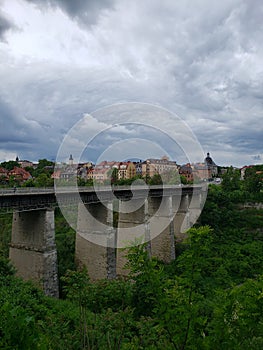 View of the bridge of Kamianets-Podilskyi city and canyon and river in Ukraine