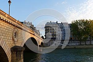View of the bridge Louis-Philippe over the Seine in Paris photo