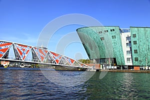 View of bridge and Science Center NEMO, Amsterdam, Netherlands