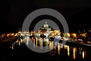 View of the bridge Vittorio Emanuele II and the dome of the Basilica of Saint Peter photo
