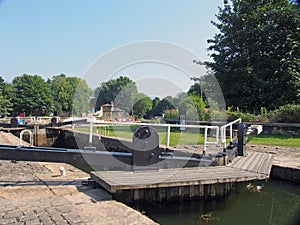 View of brighouse basin with boats and moorings and the lock gates to the calder and hebble navigation canal in west