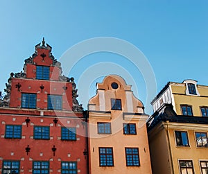 View of the bright colored old buildings on Stortorget square in Gamla stan at daytime. Landmark of Sweden